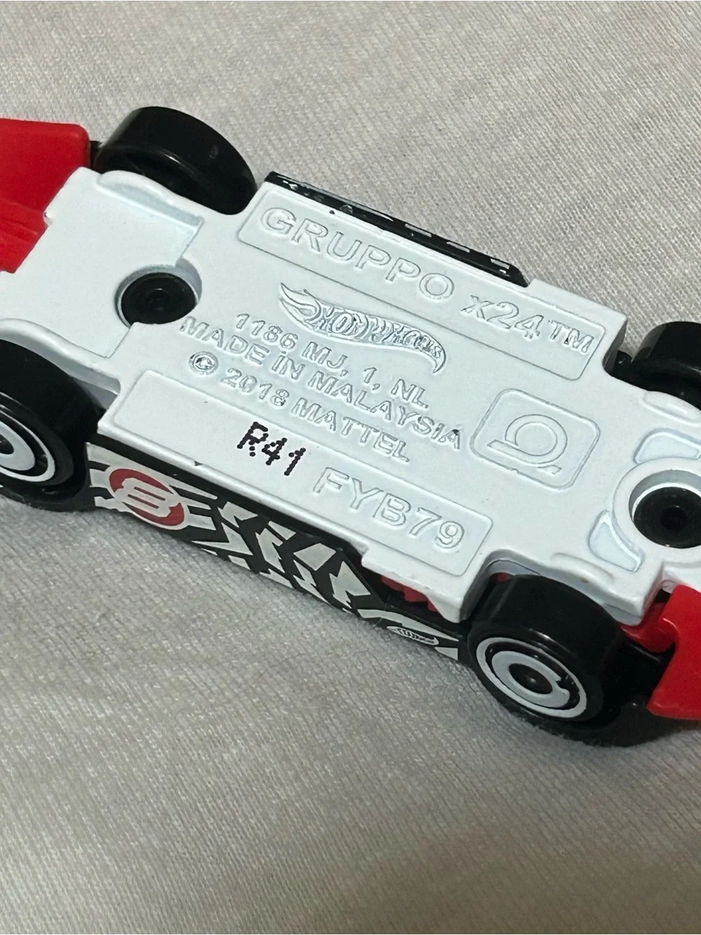 Hot Wheels Gruppo X24 - Black w/ Red & White Graphics